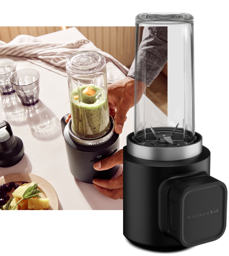   KitchenAid Go™ Cordless Personal Blender and a person using the blender to blend a green smoothie.
