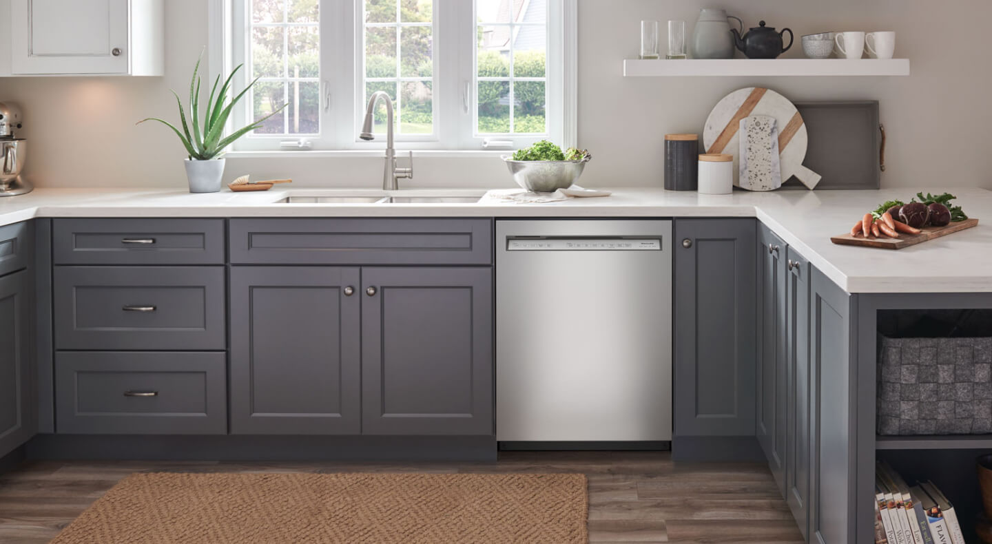 Stainless steel KitchenAid® dishwasher in a modern kitchen 