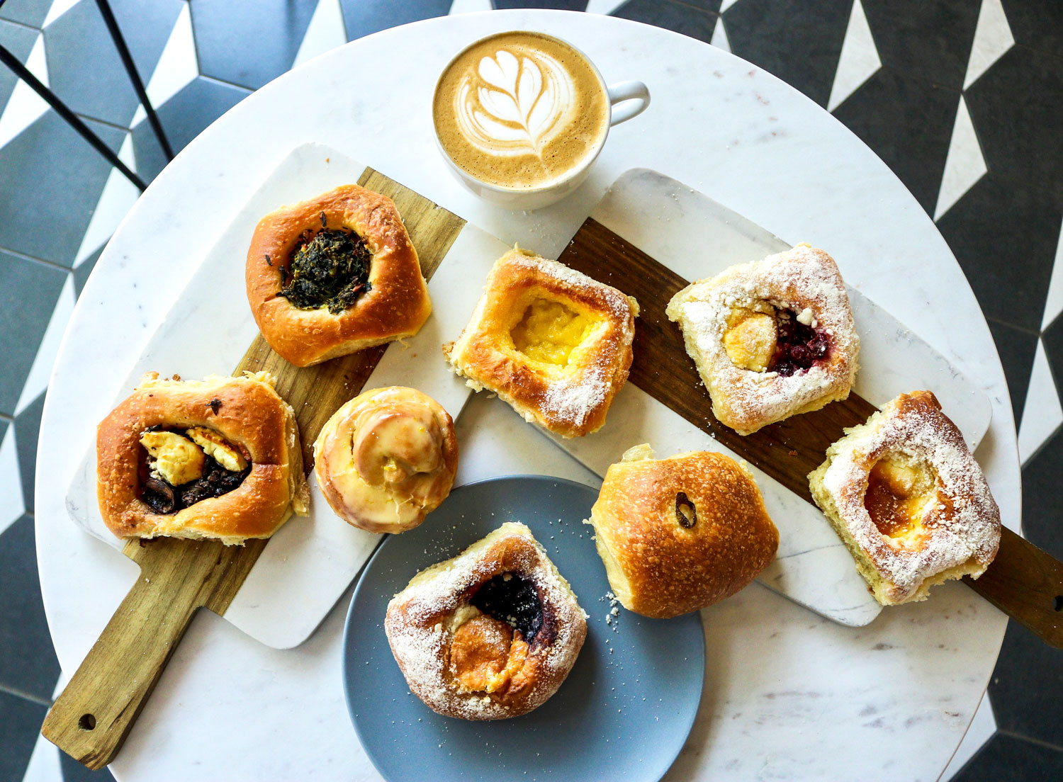 Cutting boards topped with kolaches.