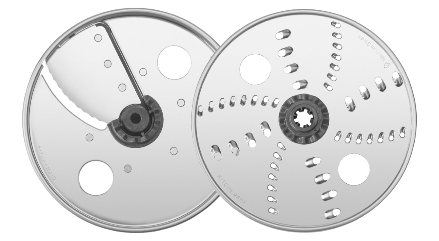 Two food processor blades.
