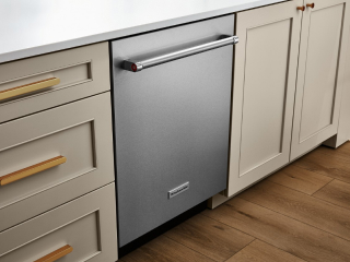 Dishwasher set in tan cabinetry