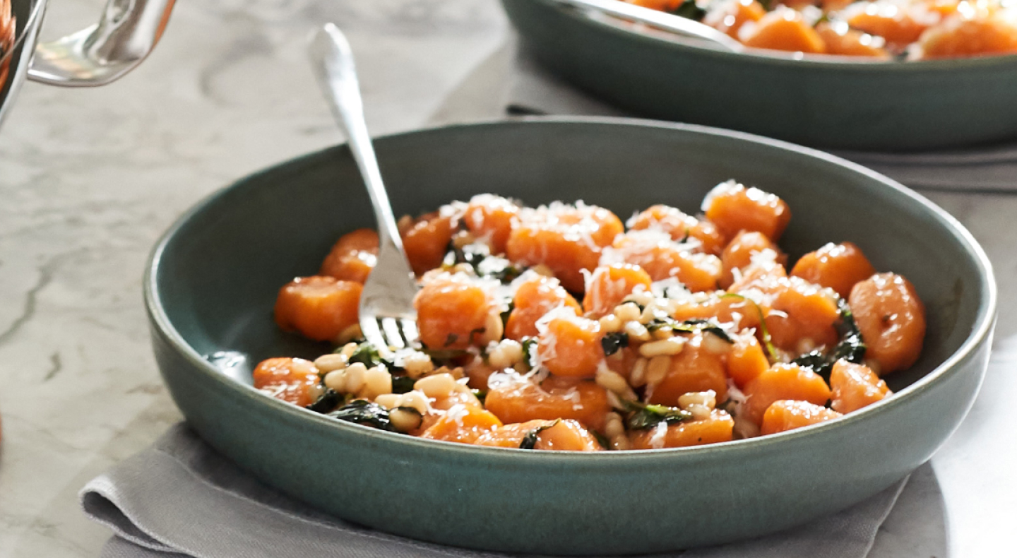 Potato gnocchi in blue bowl 