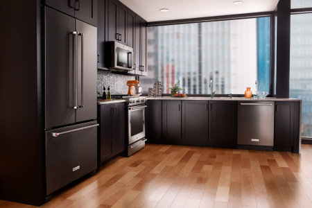 Stainless steel KitchenAid® appliances in an L-shaped kitchen