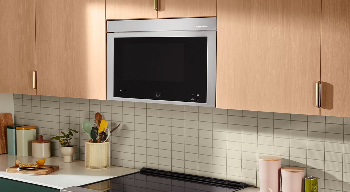 A KitchenAid® over-the-range microwave in a kitchen