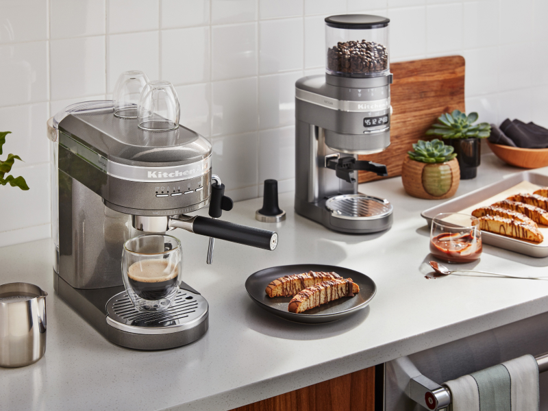 KitchenAid® espresso maker next to homemade biscotti