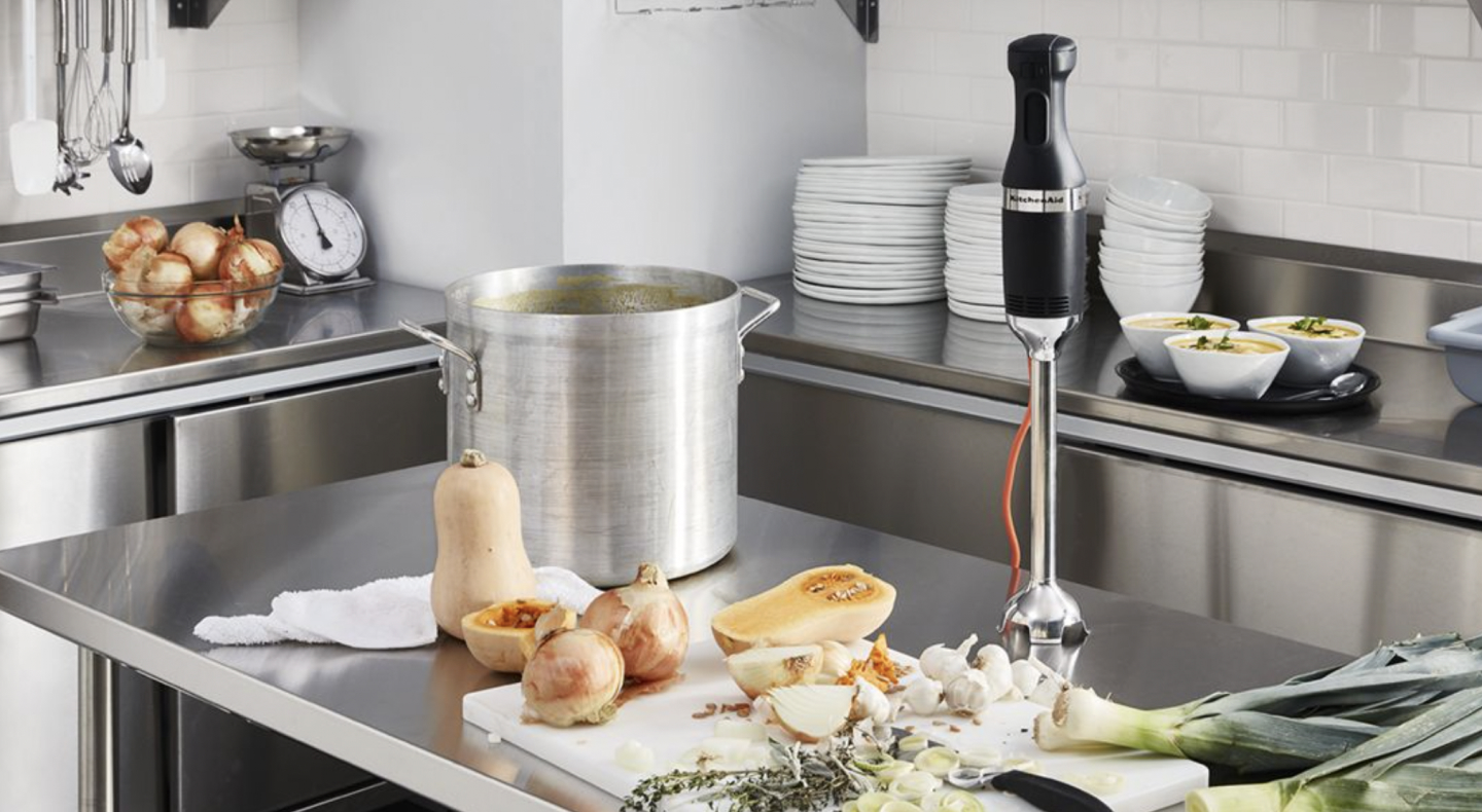 Commercial immersion blender on metal countertop
