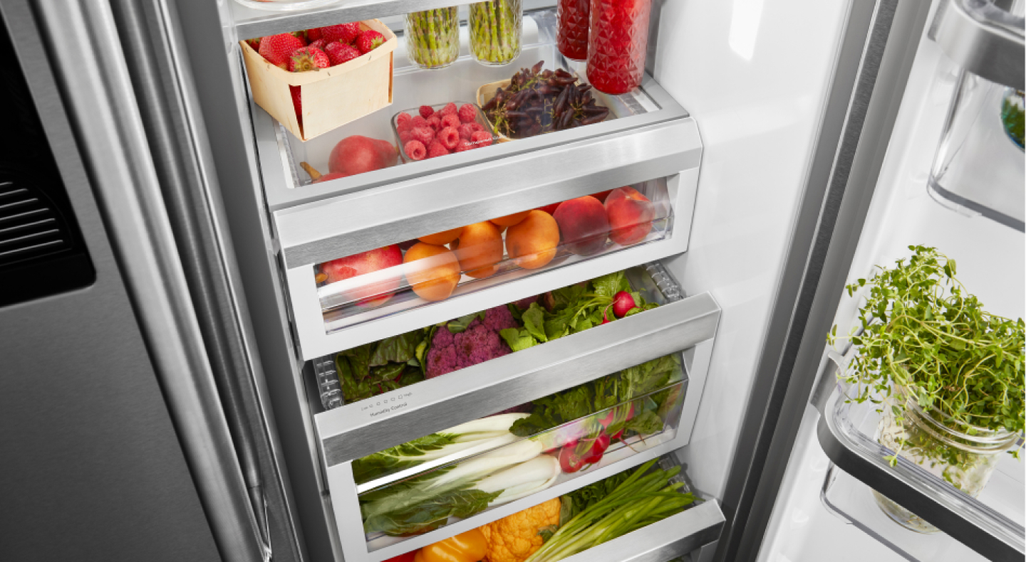 Birds-eye view of fresh product organized inside of a refrigerator