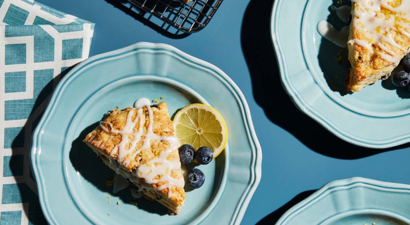 Lemon blueberry scone on plate.