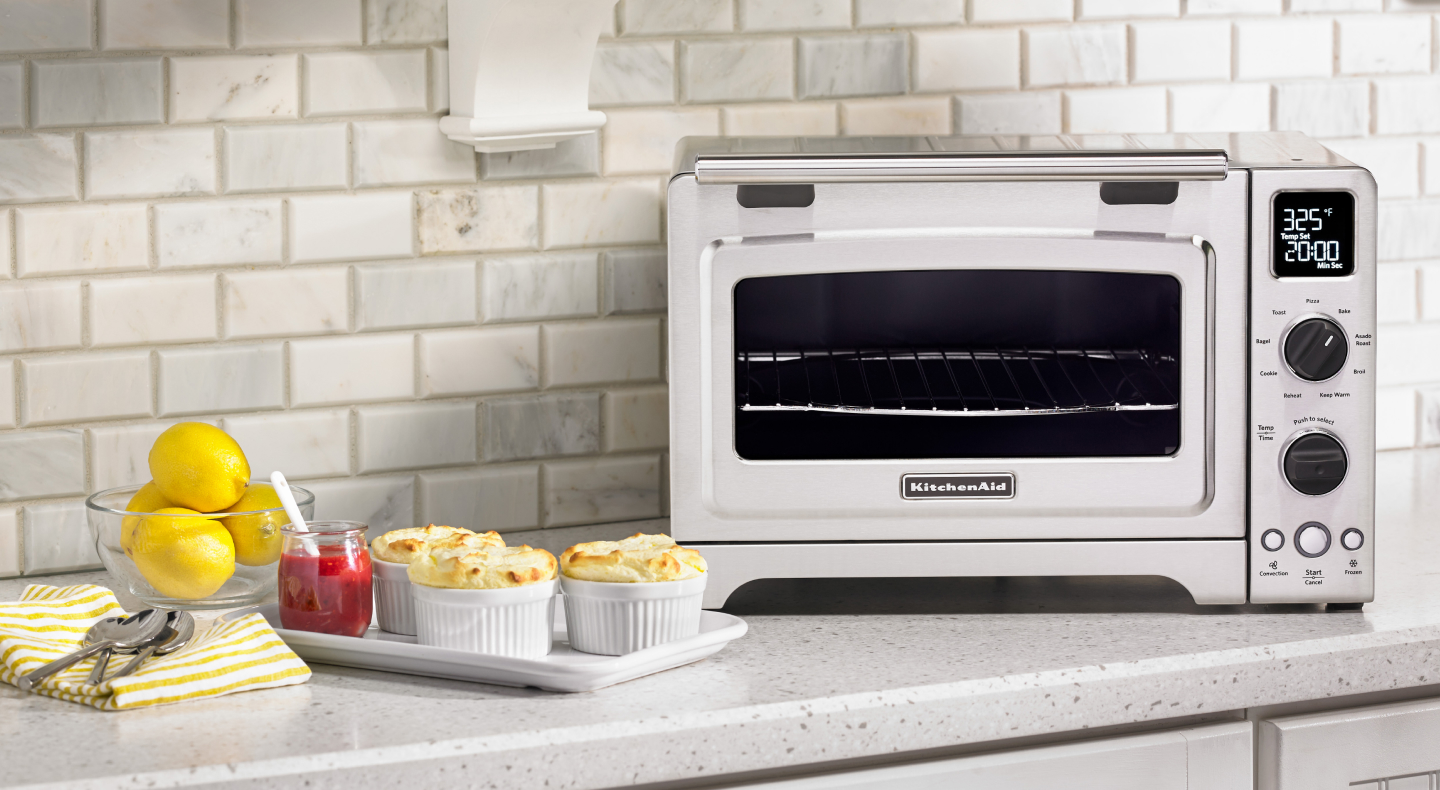 Lemon dessert next to a KitchenAid® countertop oven.