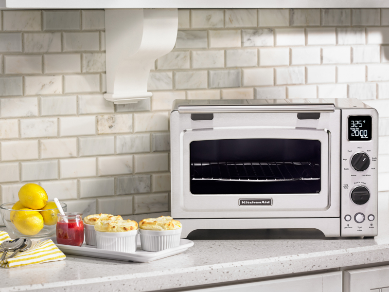 Lemon dessert next to a KitchenAid® countertop oven.