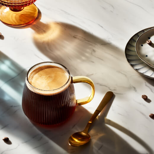 Americano in a glass mug