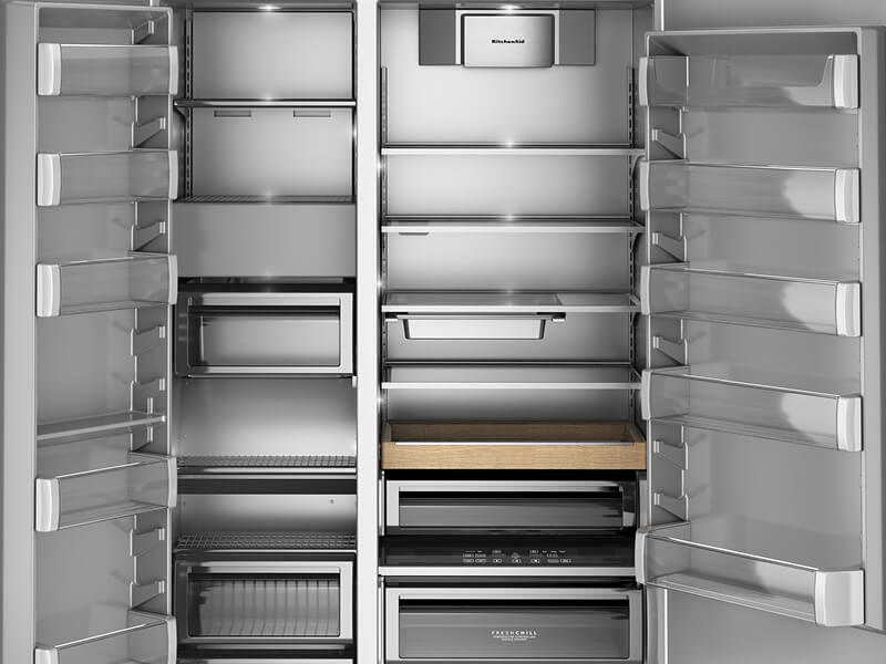 Interior of empty side-by-side refrigerator with premium interior finishes