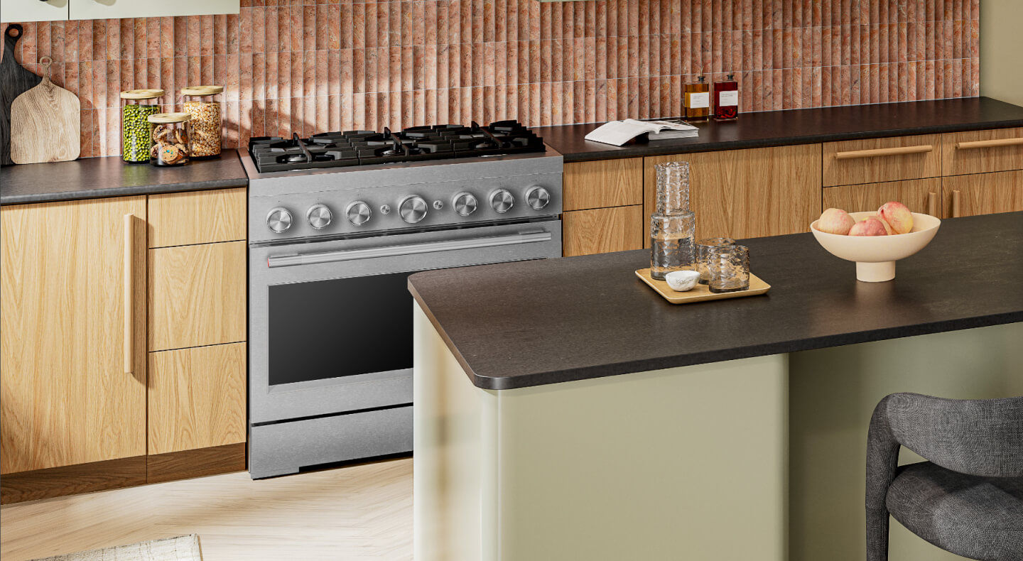 A modern kitchen with an island and a KitchenAid® commercial range