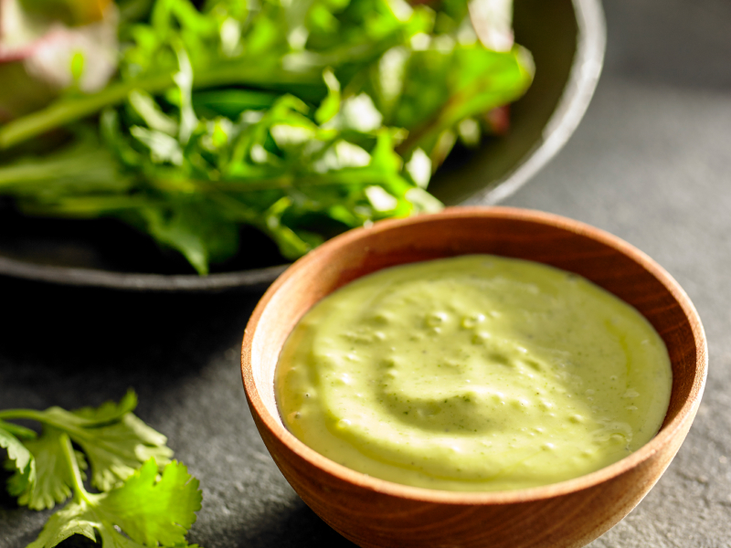 A dish of avocado cilantro dressing.
