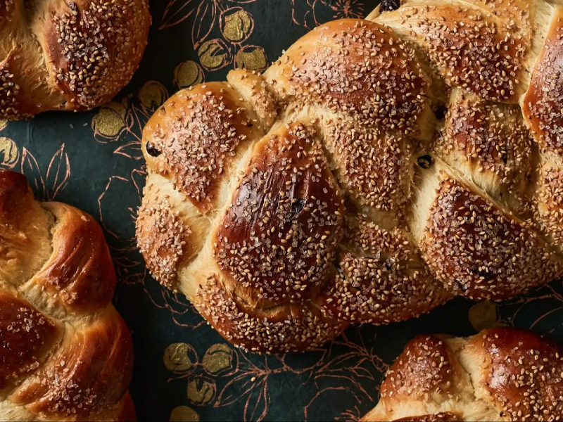 Close-up of challah bread with sesame seeds