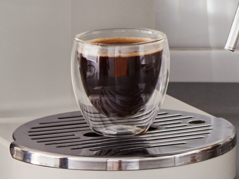 Glass cup of lungo