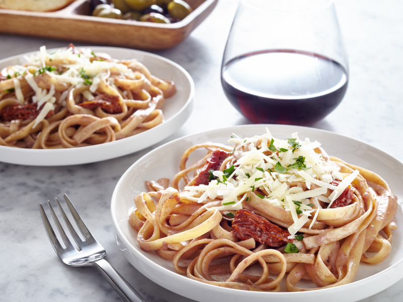 Two plates of pasta