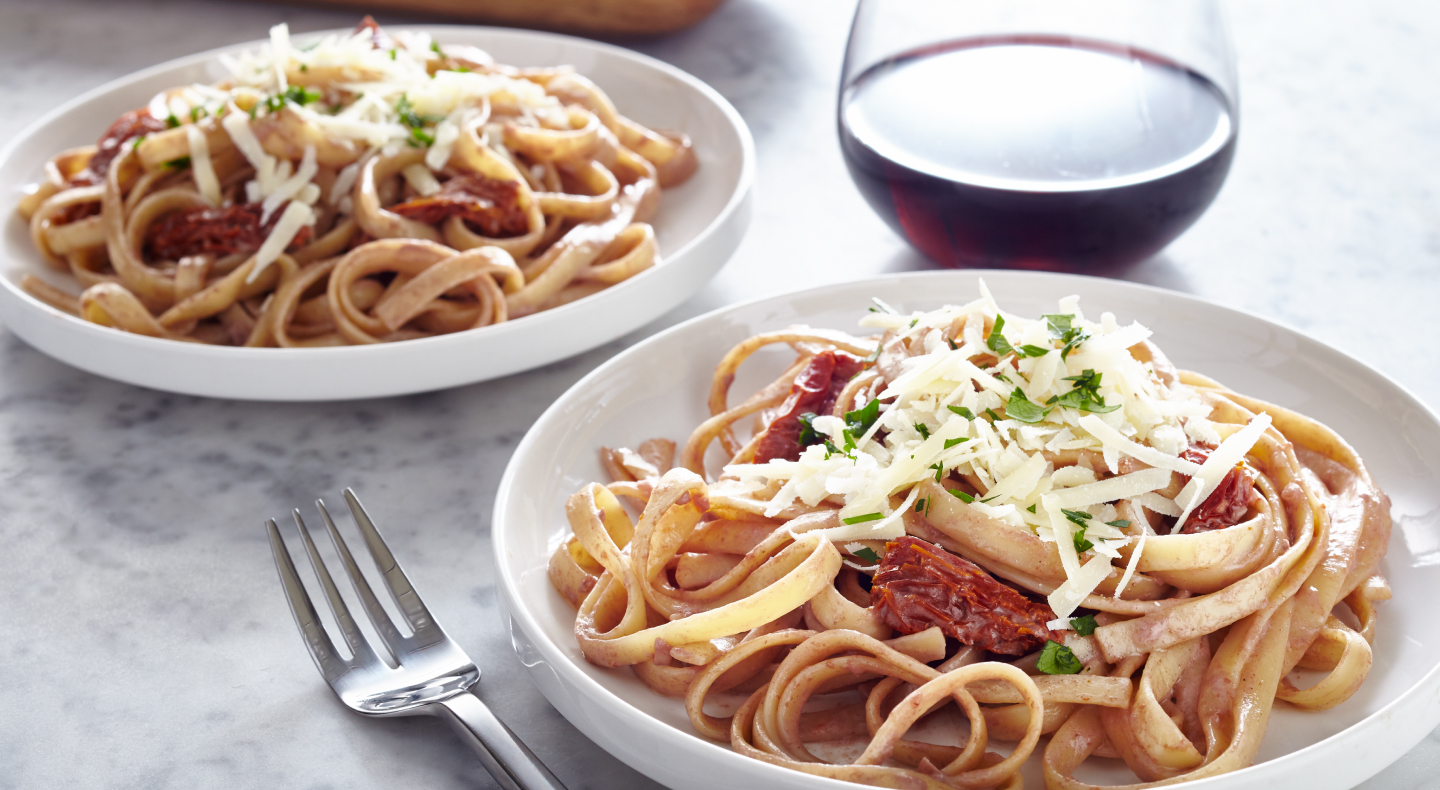 Two plates of pasta
