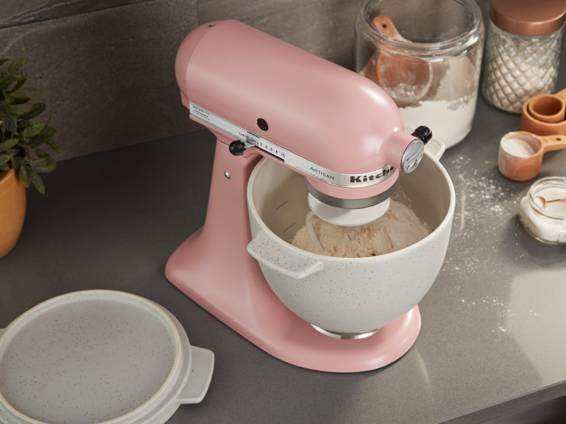 Pink KitchenAid® stand mixer with rice dough in stainless steel bowl