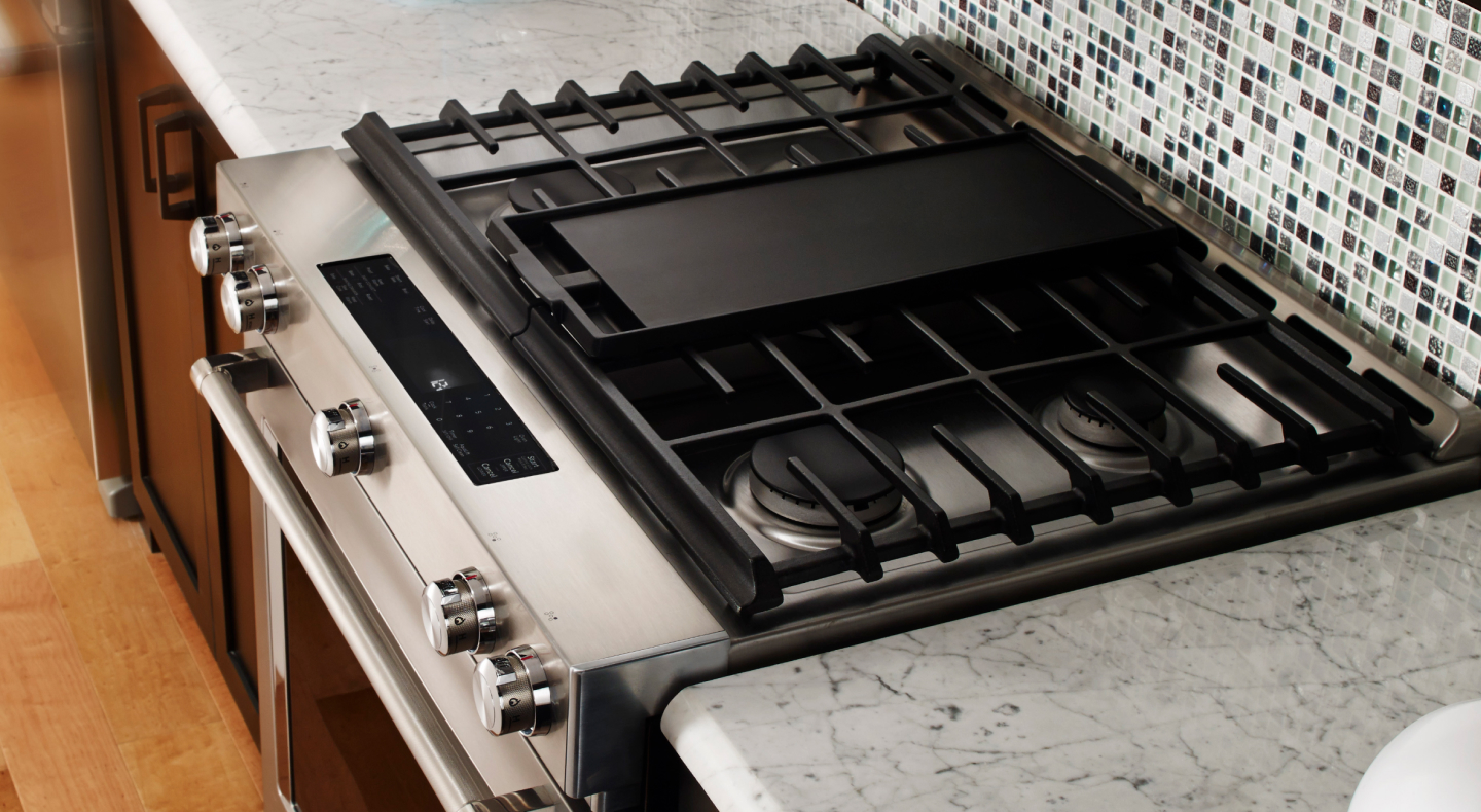 A griddle on a gas stove