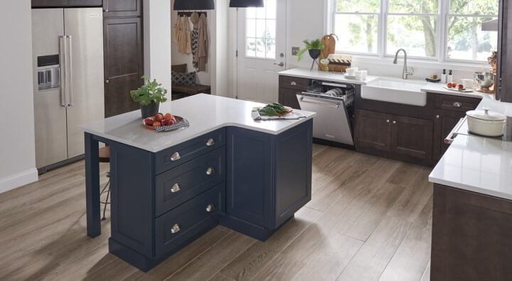  A kitchen with a large island and stainless steel appliances