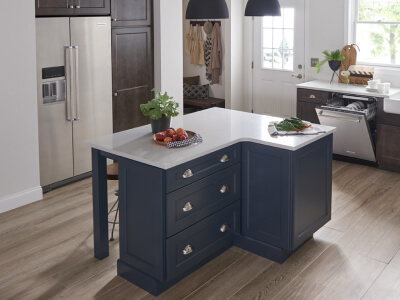  A kitchen with a large island and stainless steel appliances