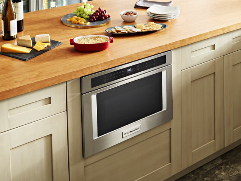 Undercounter KitchenAid® microwave built into cabinetry