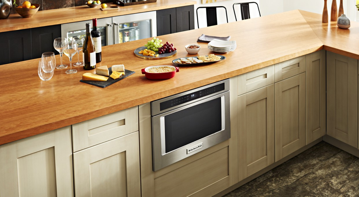Undercounter KitchenAid® microwave built into cabinetry