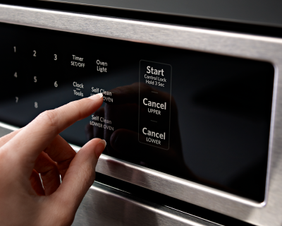 Person starting the self-clean setting