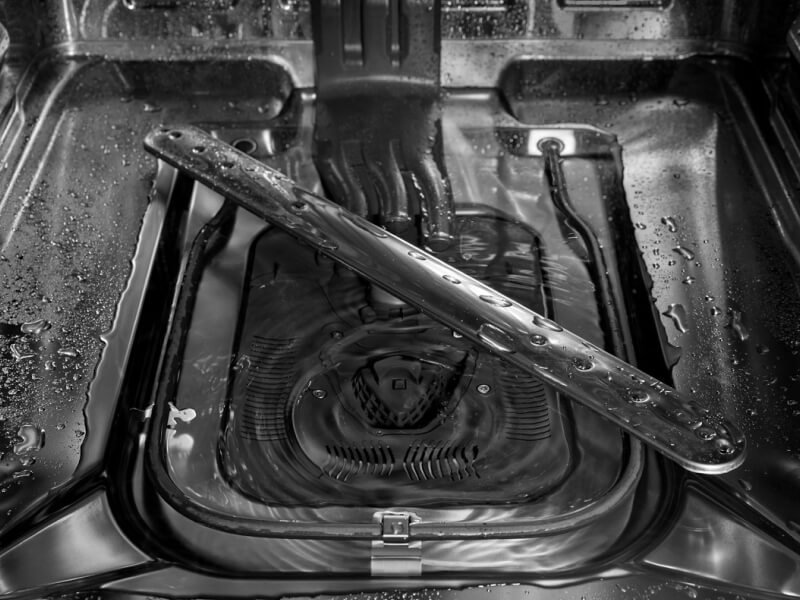 Inside of a dishwasher with water droplets