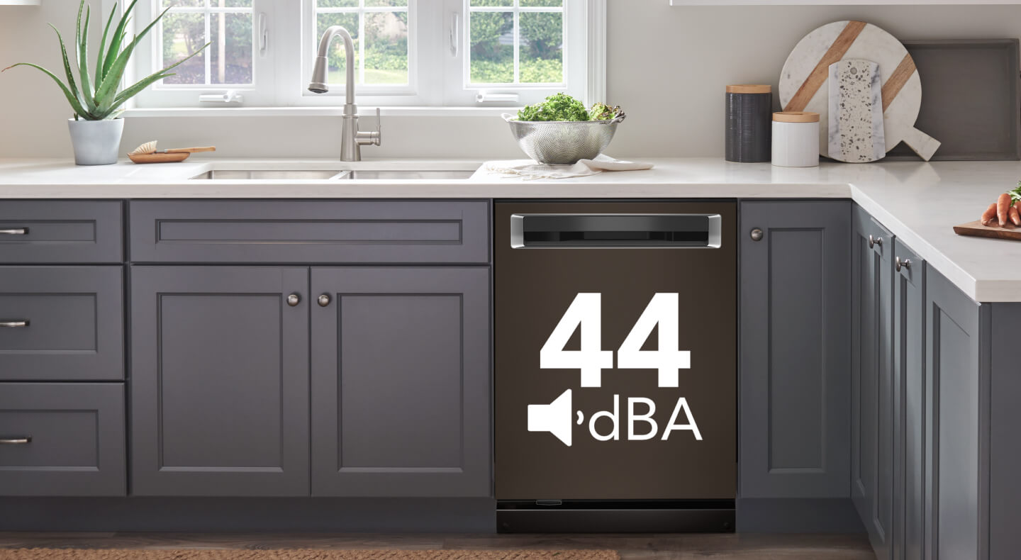 Dishwasher set in cabinetry with 44 dBA displayed on it