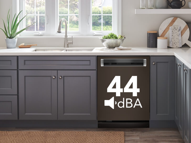 Dishwasher set in cabinetry with 44 dBA displayed on it