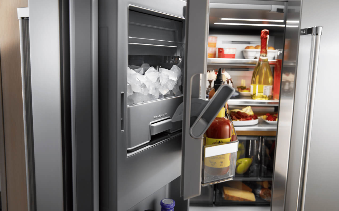 An in-door ice dispenser in a refrigerator