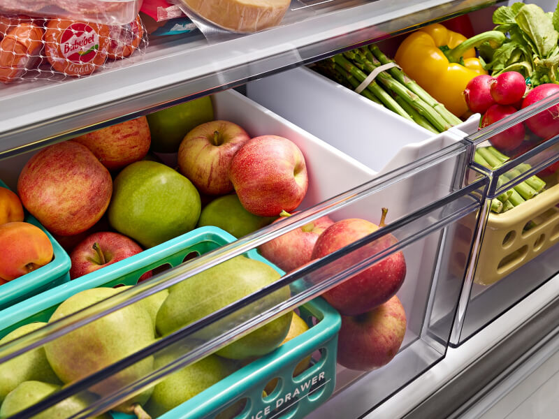 Produce in drawers in a refrigerator