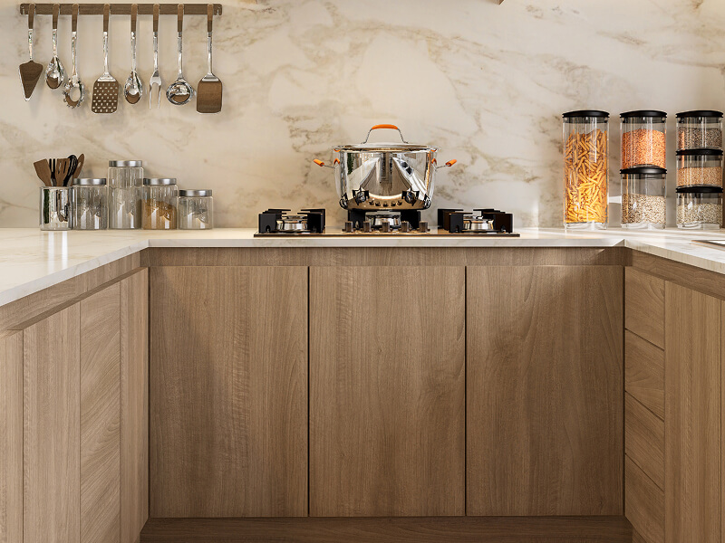Light brown cabinetry with no handles on cabinets or drawers