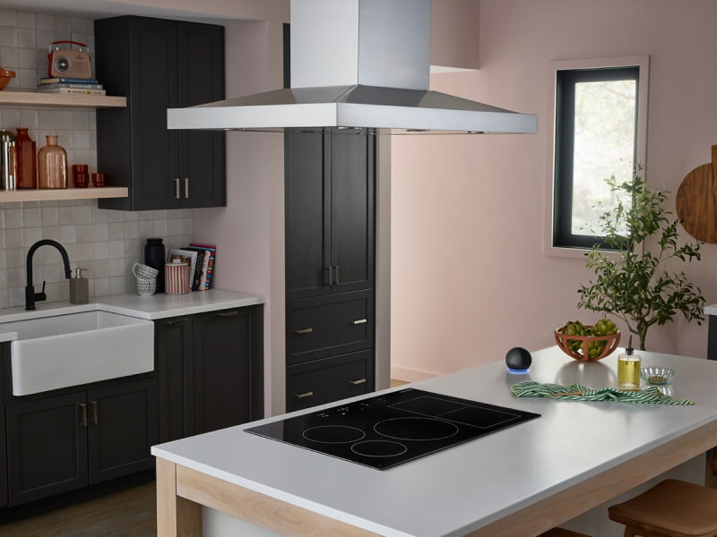 KitchenAid® cooktop in a white kitchen island countertop