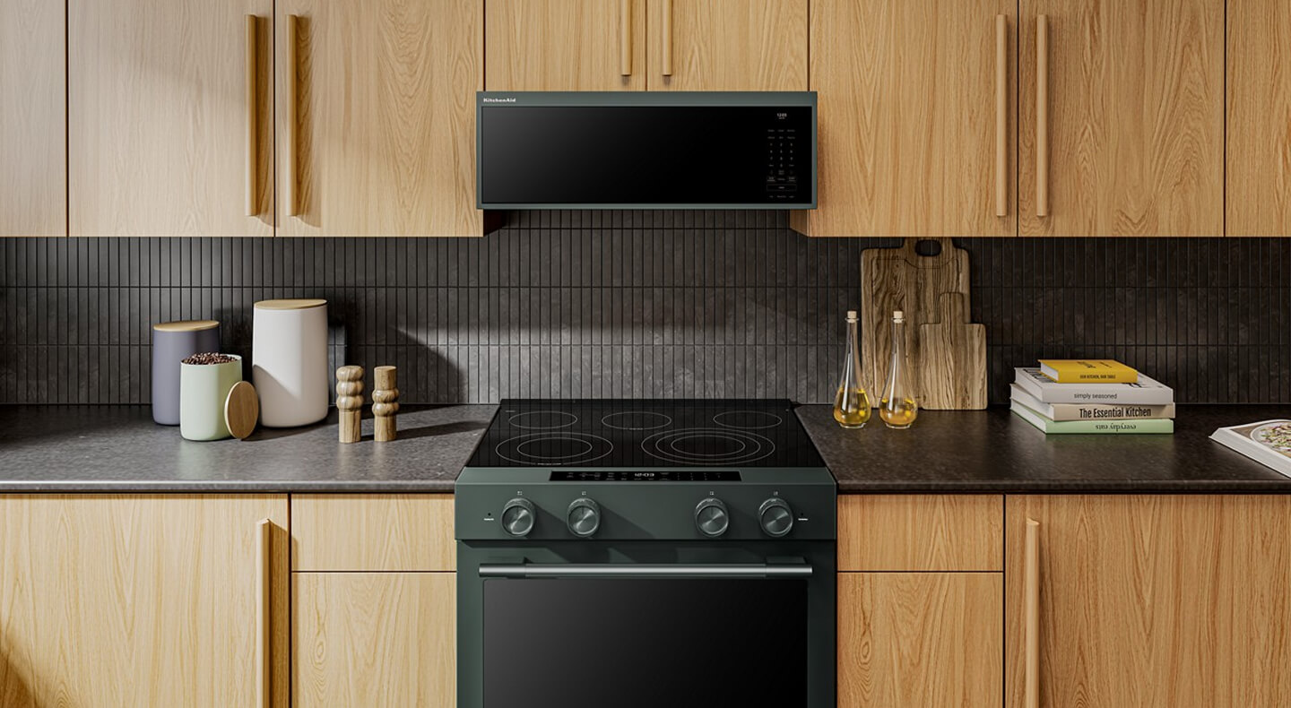 A KitchenAid® range and microwave in a kitchen