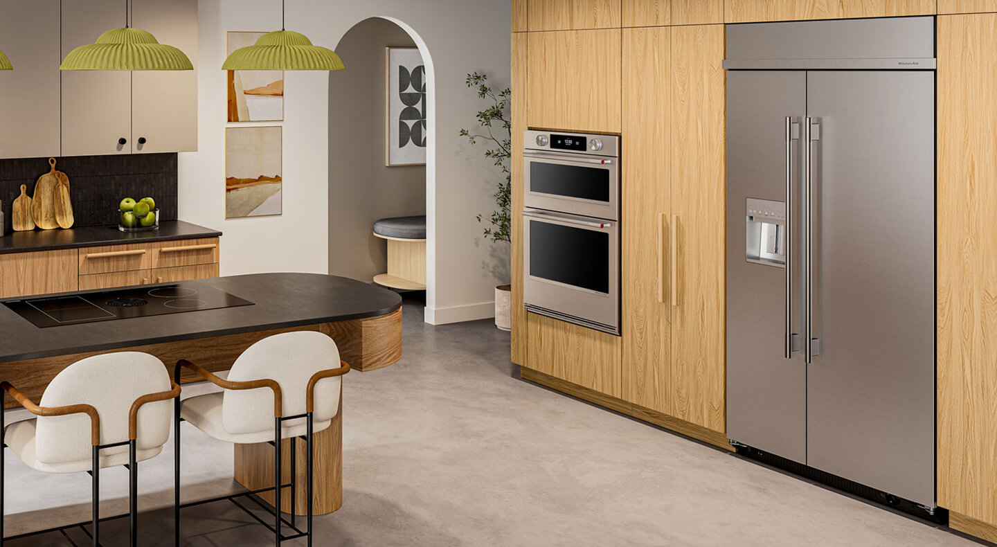 Built-in KitchenAid® side-by-side refrigerator in natural wood cabinetry