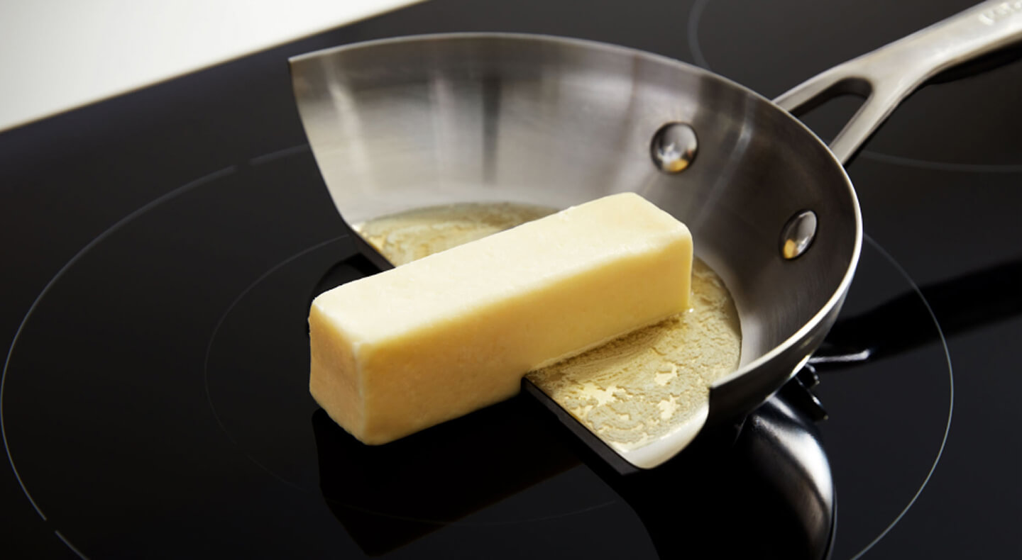 Butter cooking on pan but not on the surface of an induction cooktop