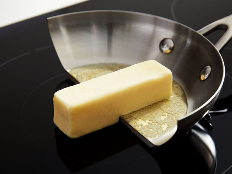 Butter cooking on pan but not on the surface of an induction cooktop
