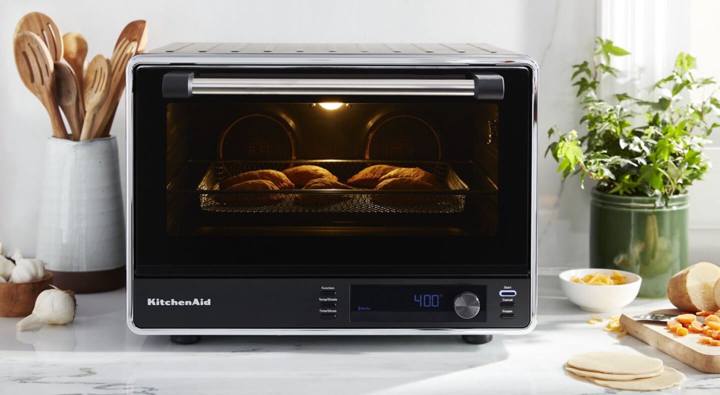 KitchenAid® countertop oven with empanadas inside