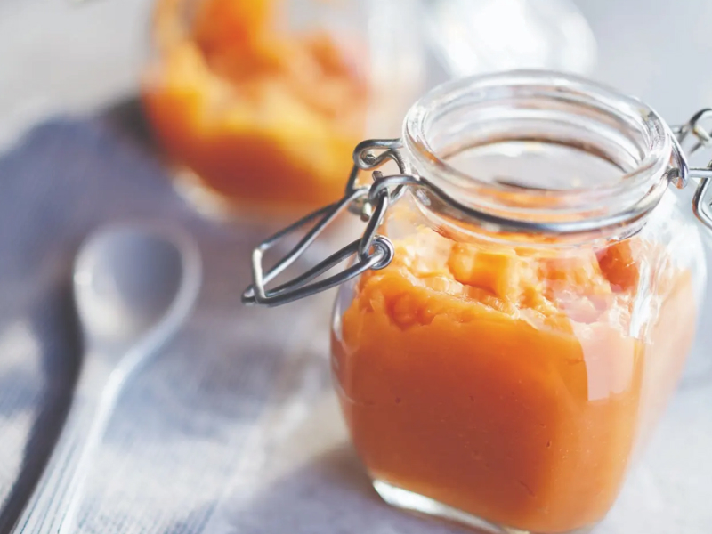Homemade pumpkin puree in glass jar