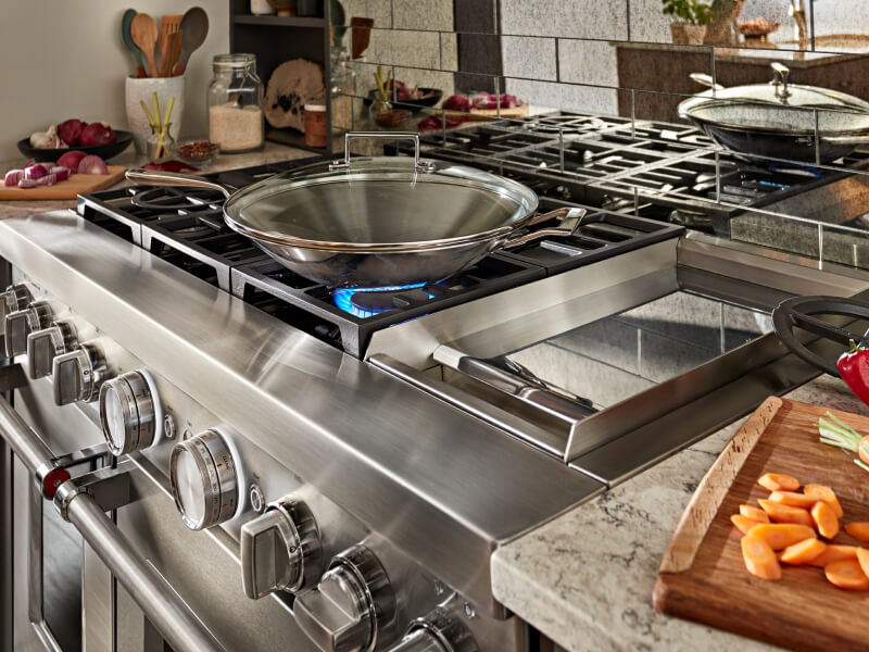 Wok on a gas range cooktop
