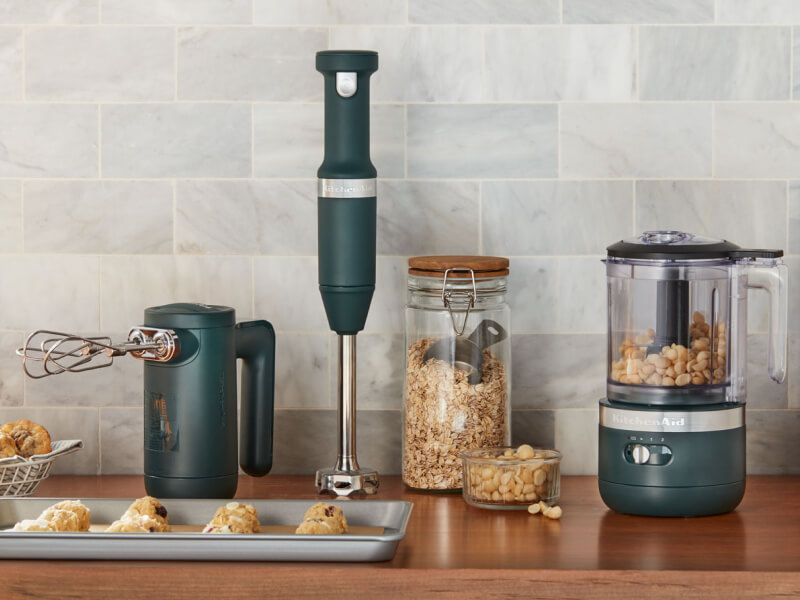 KitchenAid® black cordless hand mixer, hand blender and food chopper on a countertop