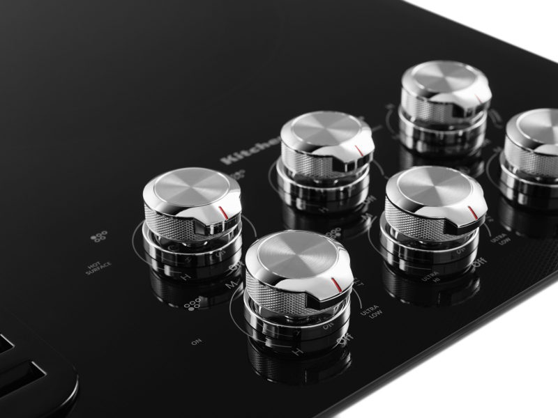 Knobs on a KitchenAid® cooktop