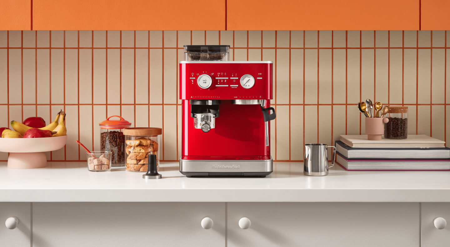  Red KitchenAid® Semi-Automatic Espresso Machine in a bright, modern kitchen