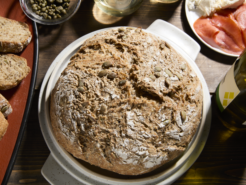 A loaf of homemade bread on a table.