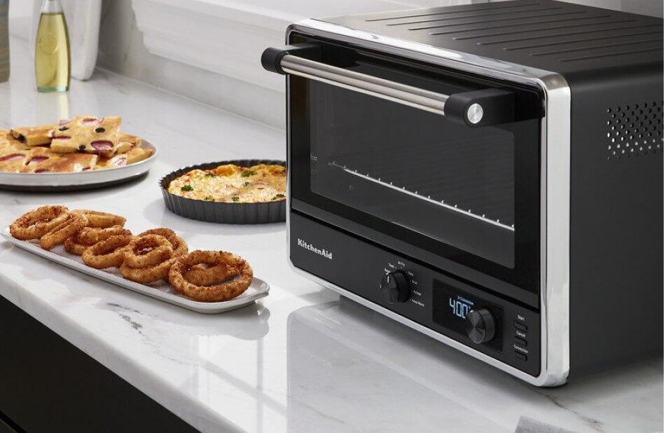 KitchenAid® countertop oven with various foods