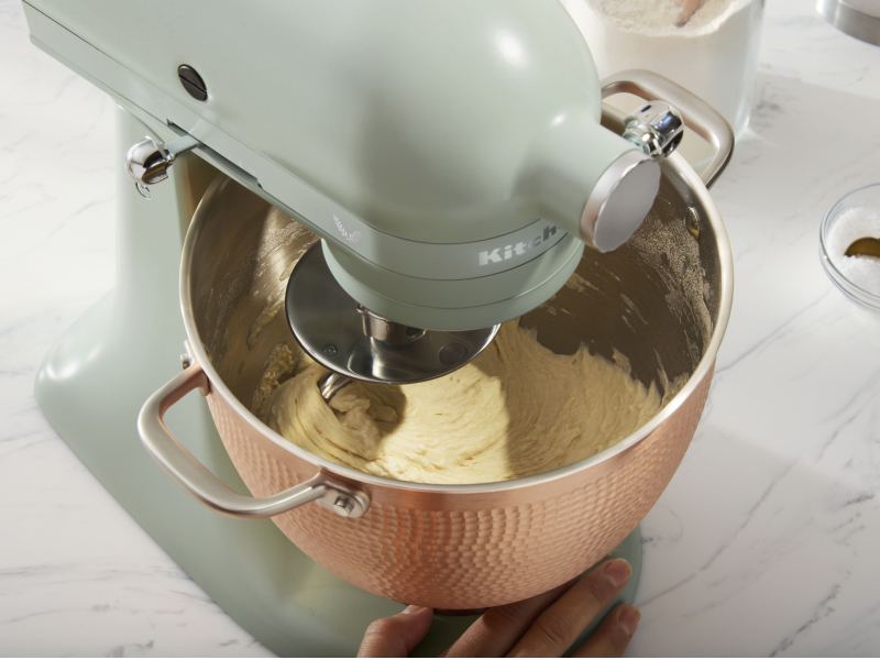 Batter being mixed inside a KitchenAid® stand mixer.