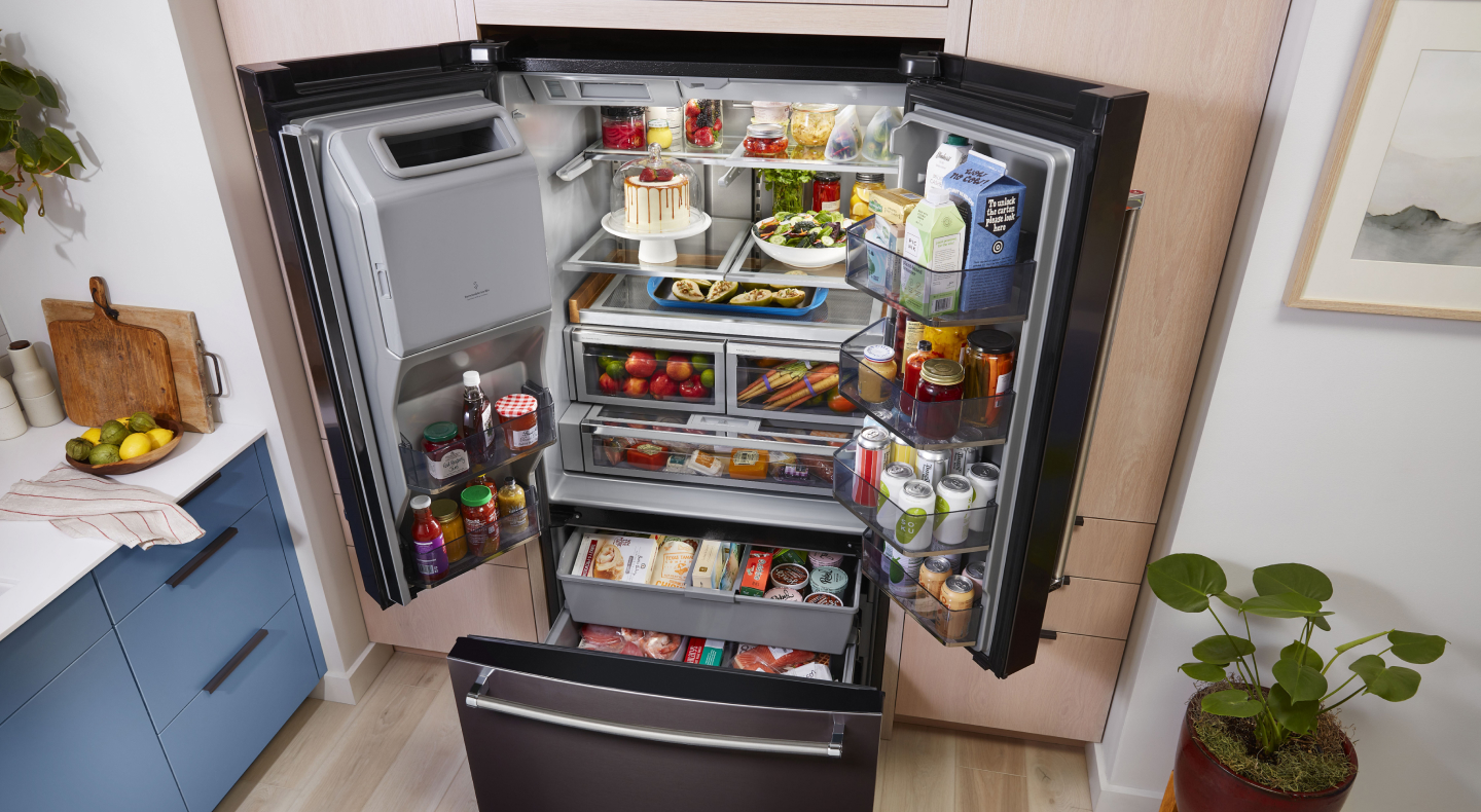 Birds-eye view of full, black stainless KitchenAid® French door refrigerator